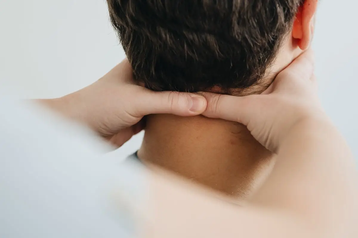 Neck pain and tension headache treatment with osteopathy at Elora Wellness